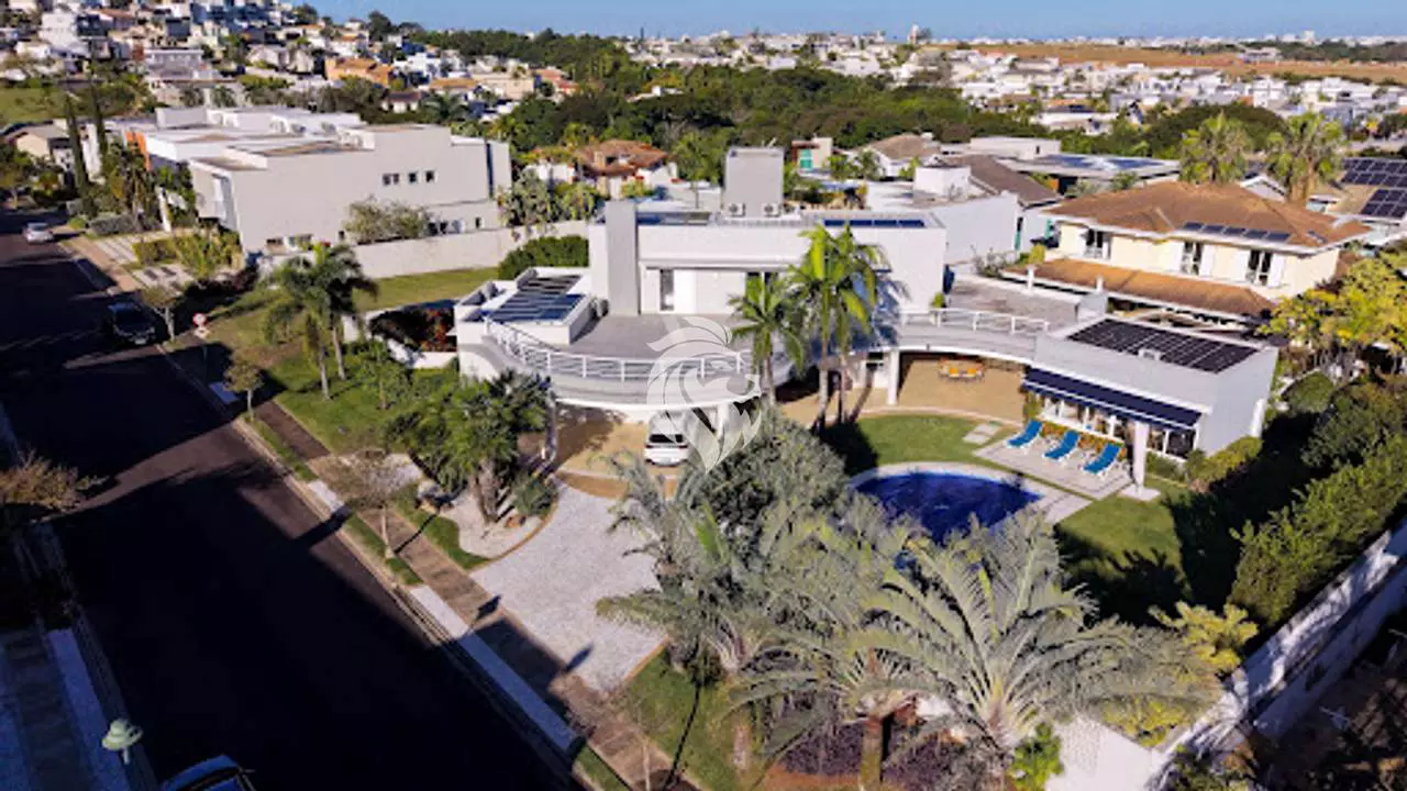 Sobrado de 580 m² com 4 suítes e paisagismo assinado no Jardim Vila Paradiso em Indaiatuba/SP